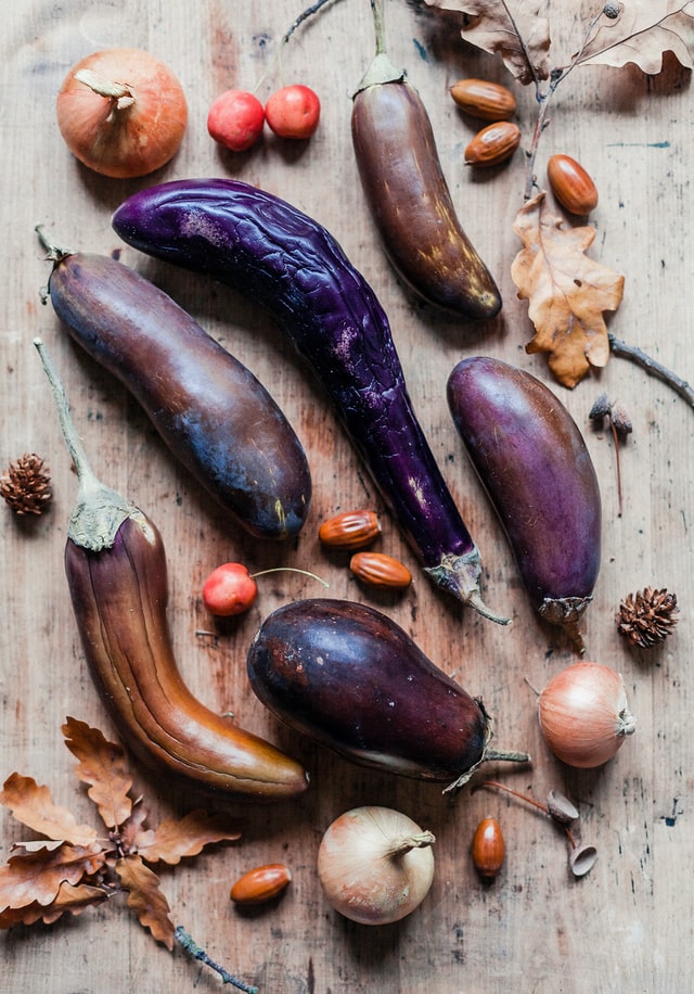 Assortment of eggplants and onions