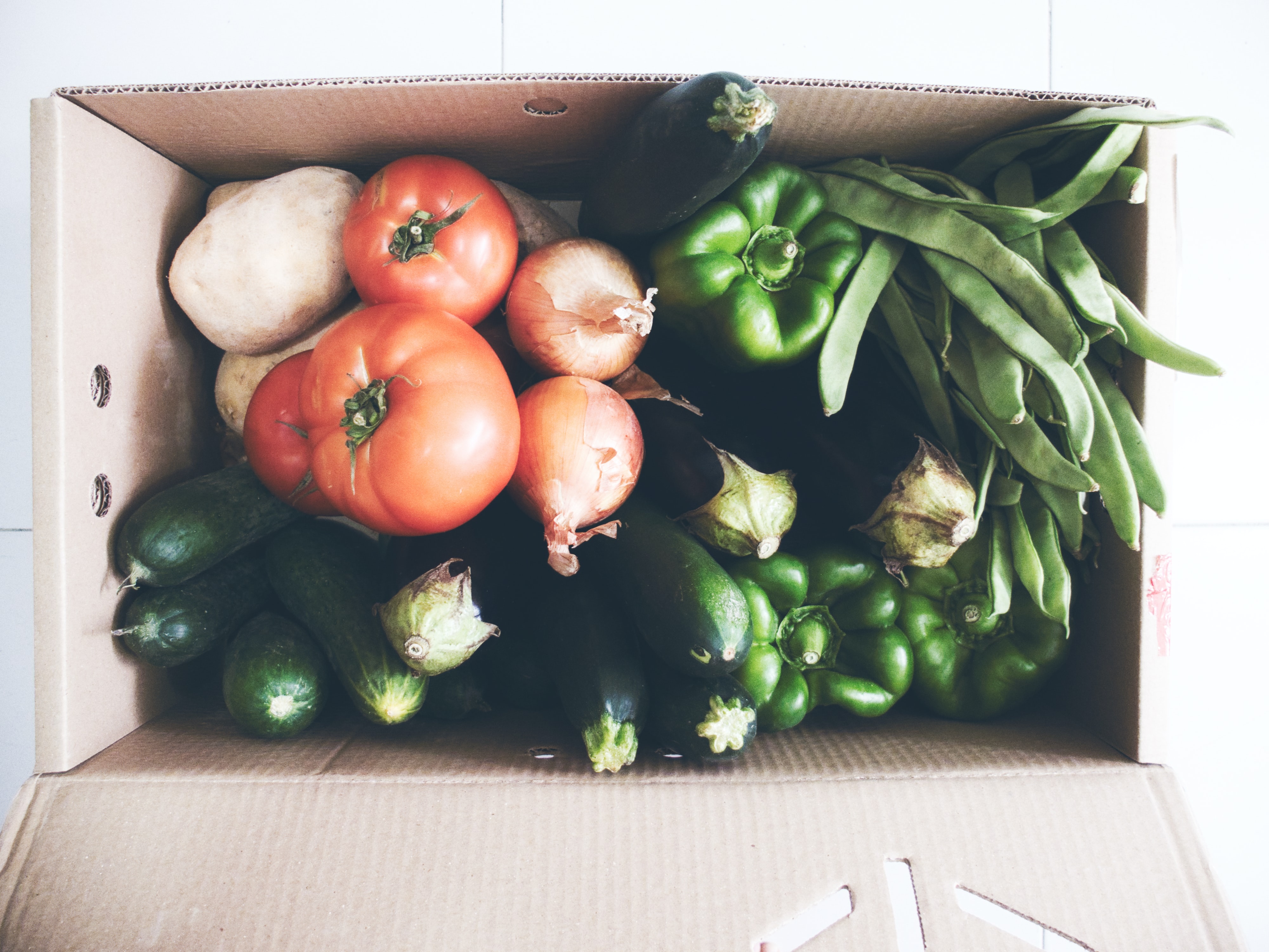 fresh vegetables in cardboard box